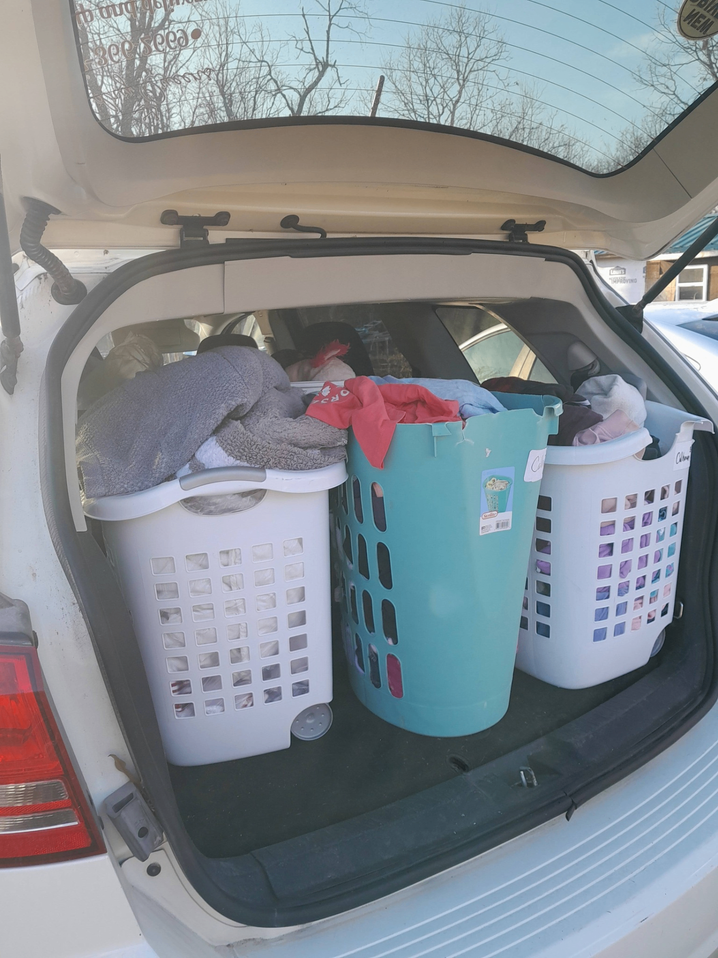 Pickup laundry baskets in Susie's car